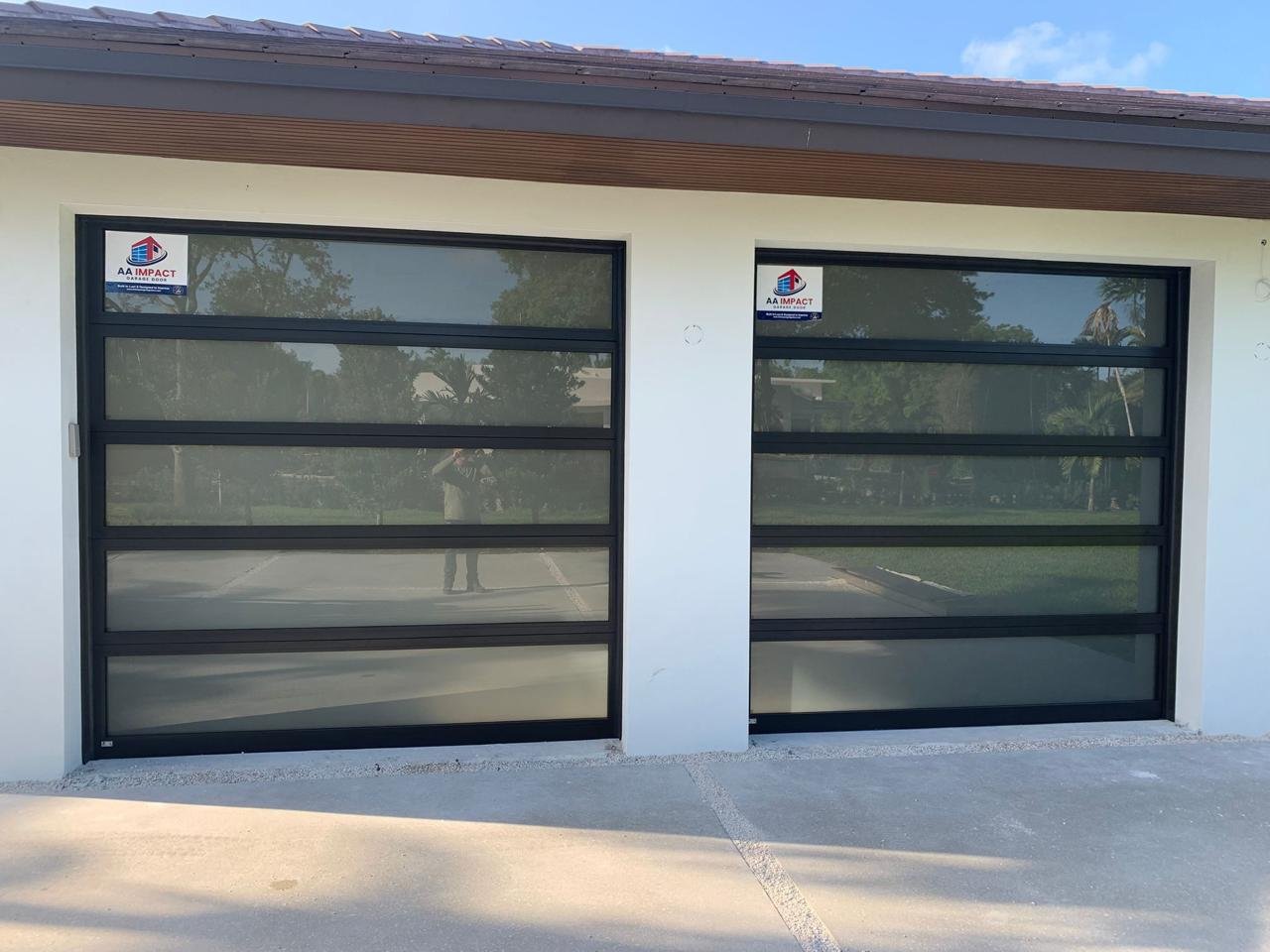 8x7 impact glass garage door installed on a South Florida home